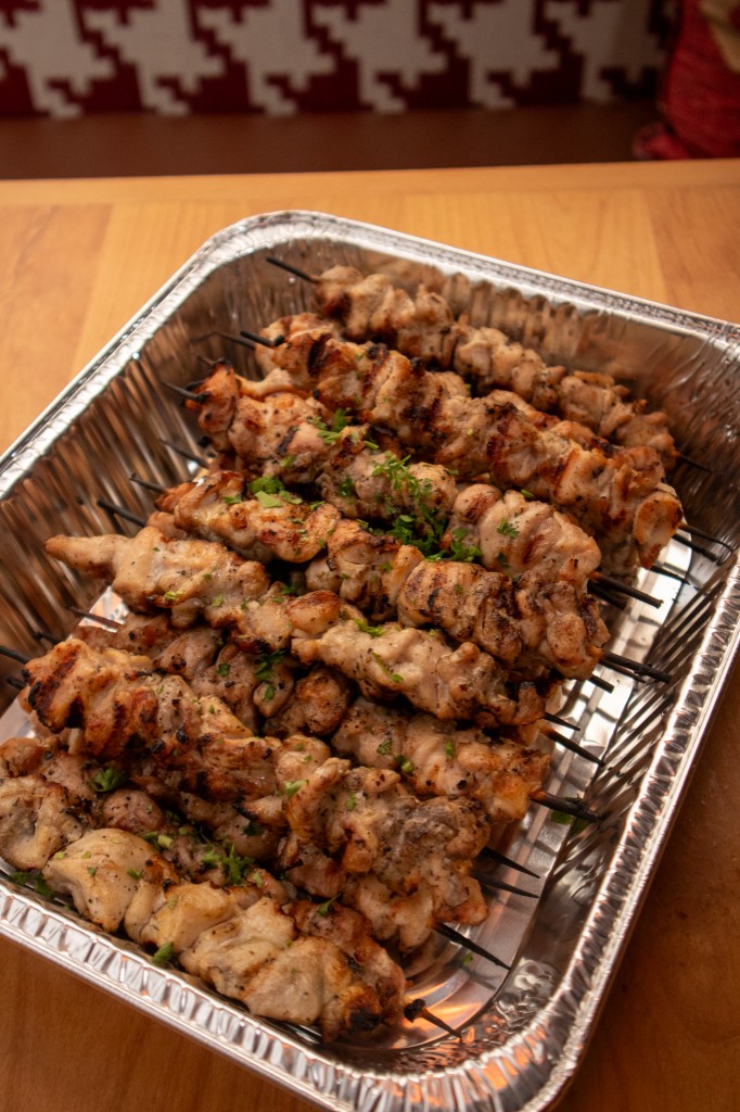 Catering tray of grilled chicken souvlaki skewers